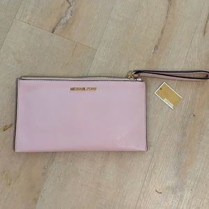 Blush Michael Kors leather clutch wristlet